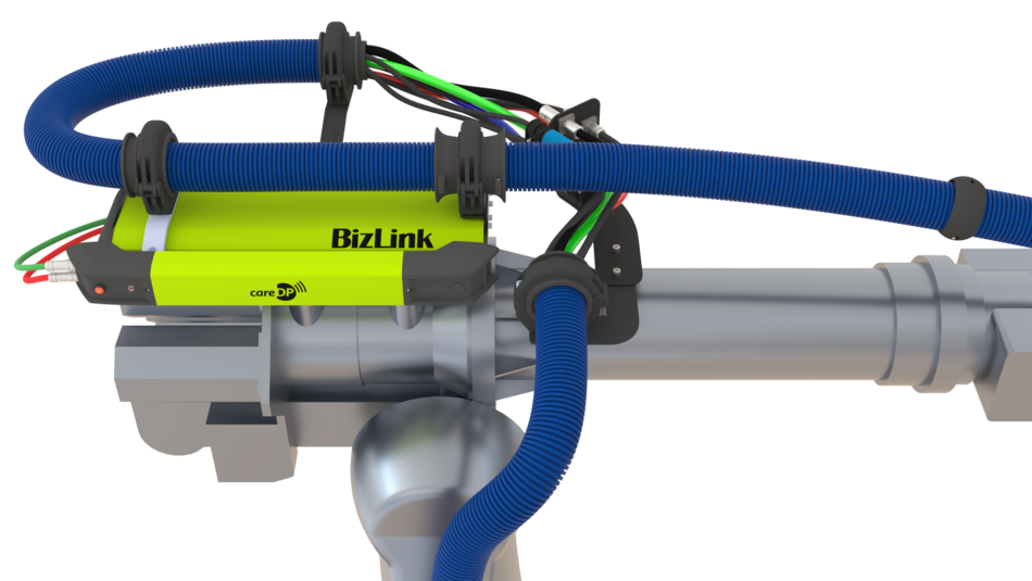 Side view of industrial robot equipped with careDP system on LSH 3 dresspack for AI-powered monitoring.